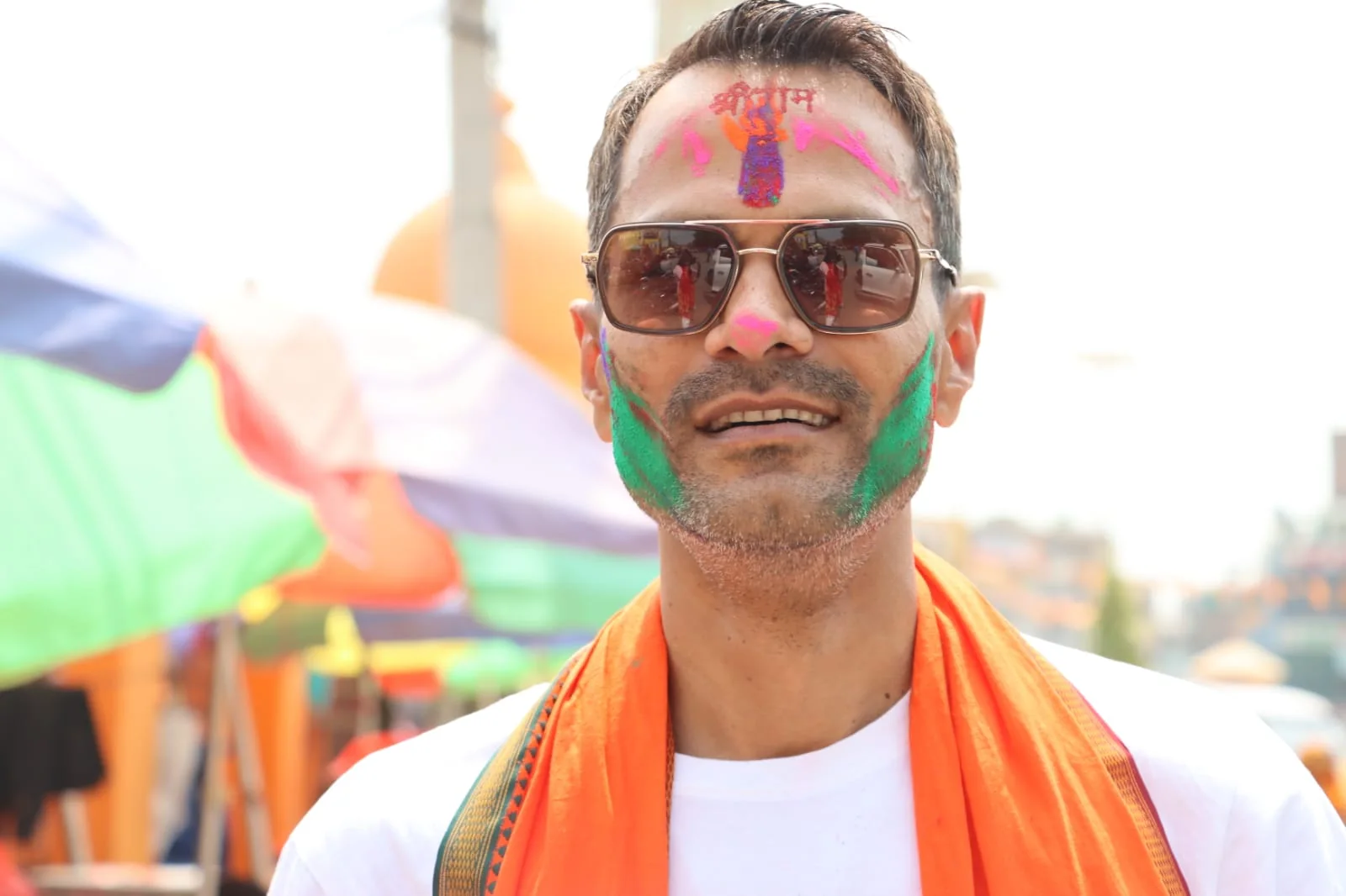 Anil Kumar Mahaseth celebrating a festival with traditional colours
